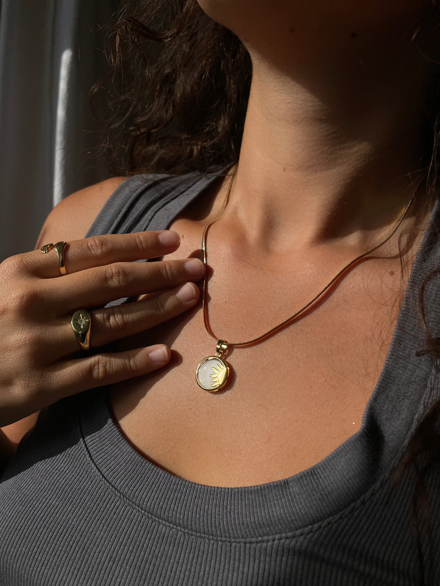 Mother of Pearl Sun Charm